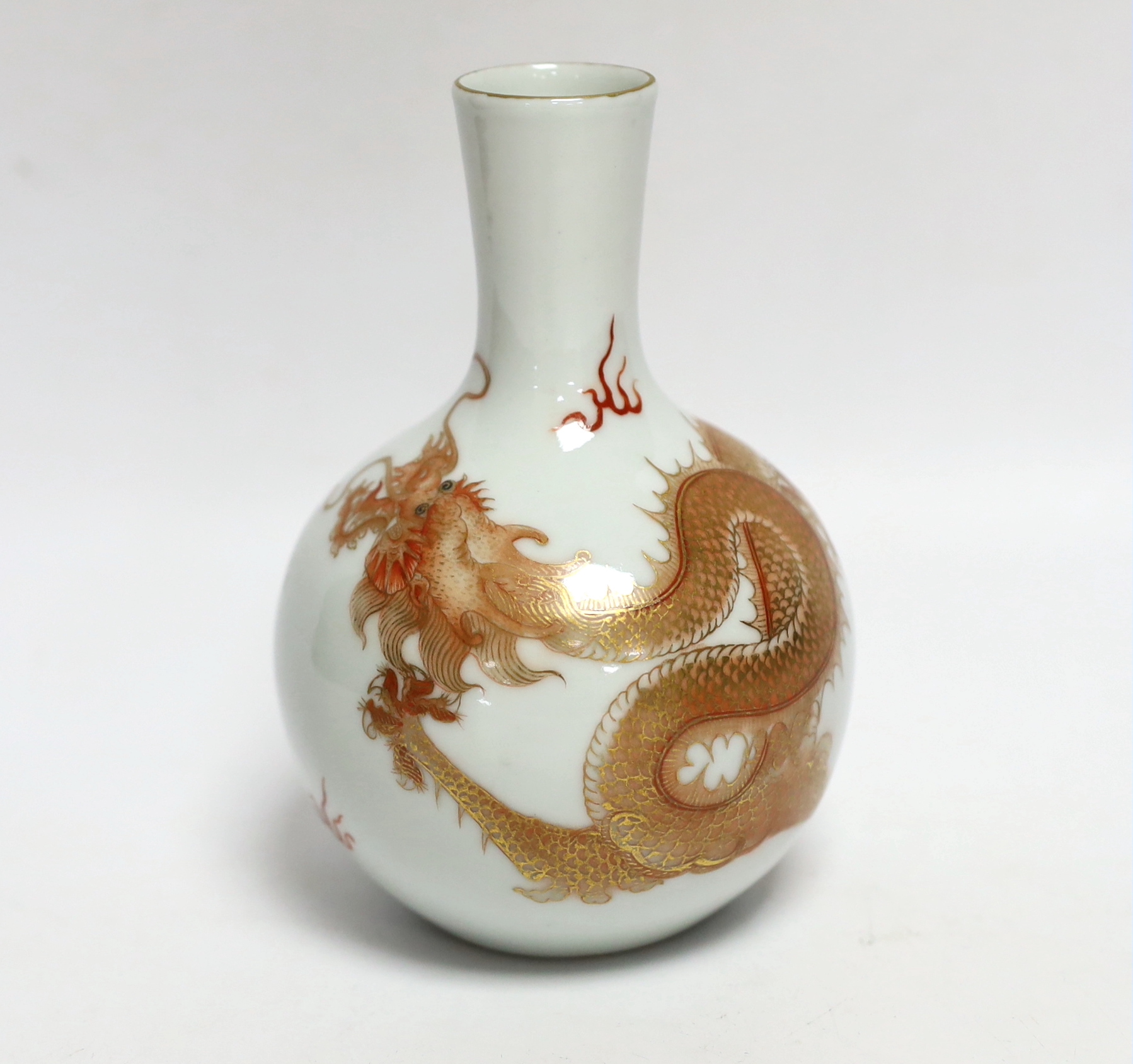 A Chinese rouge de fer dragon bottle vase, 14cm high (boxed)